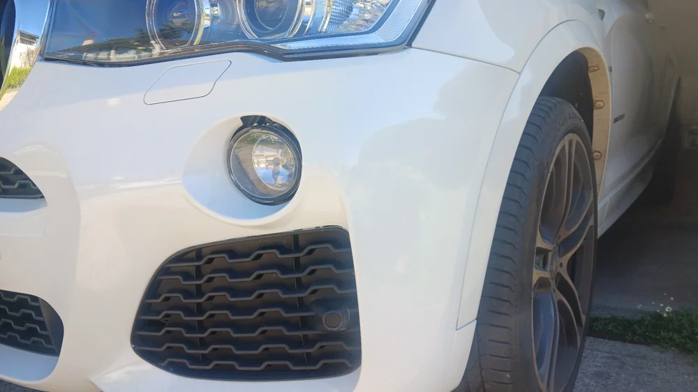 Mobile car paint repair specialist at work in Sydney